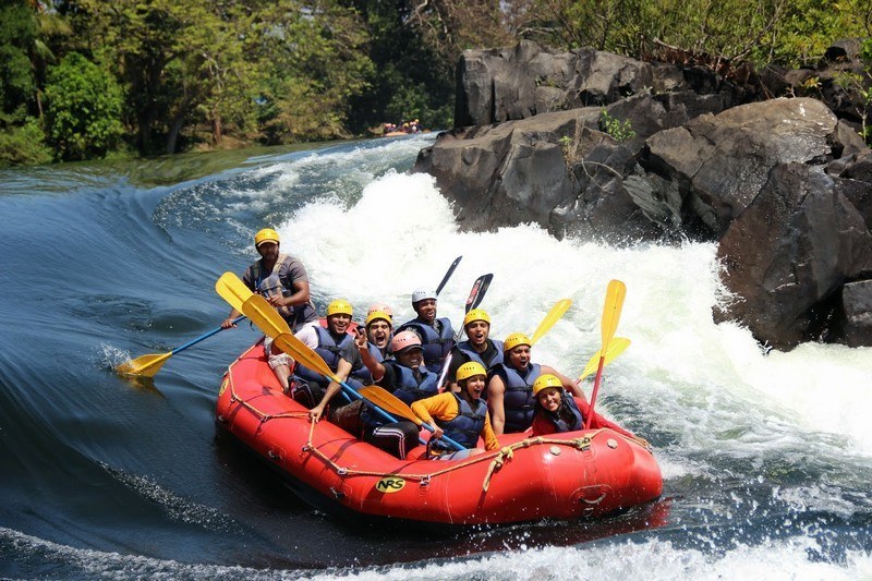 Adventure group rafting on river