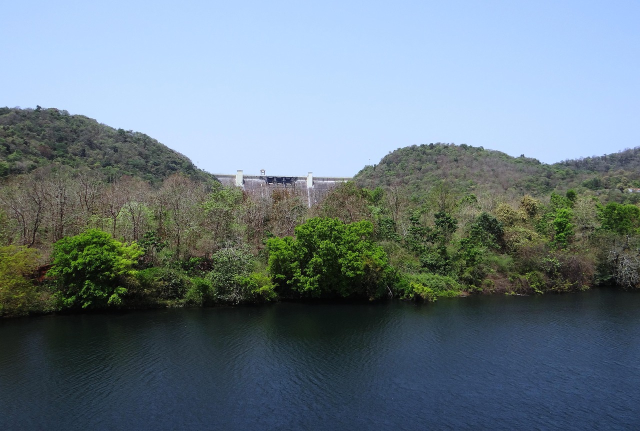 Calm backwaters of Supa Dam surrounded by hills in Dandeli